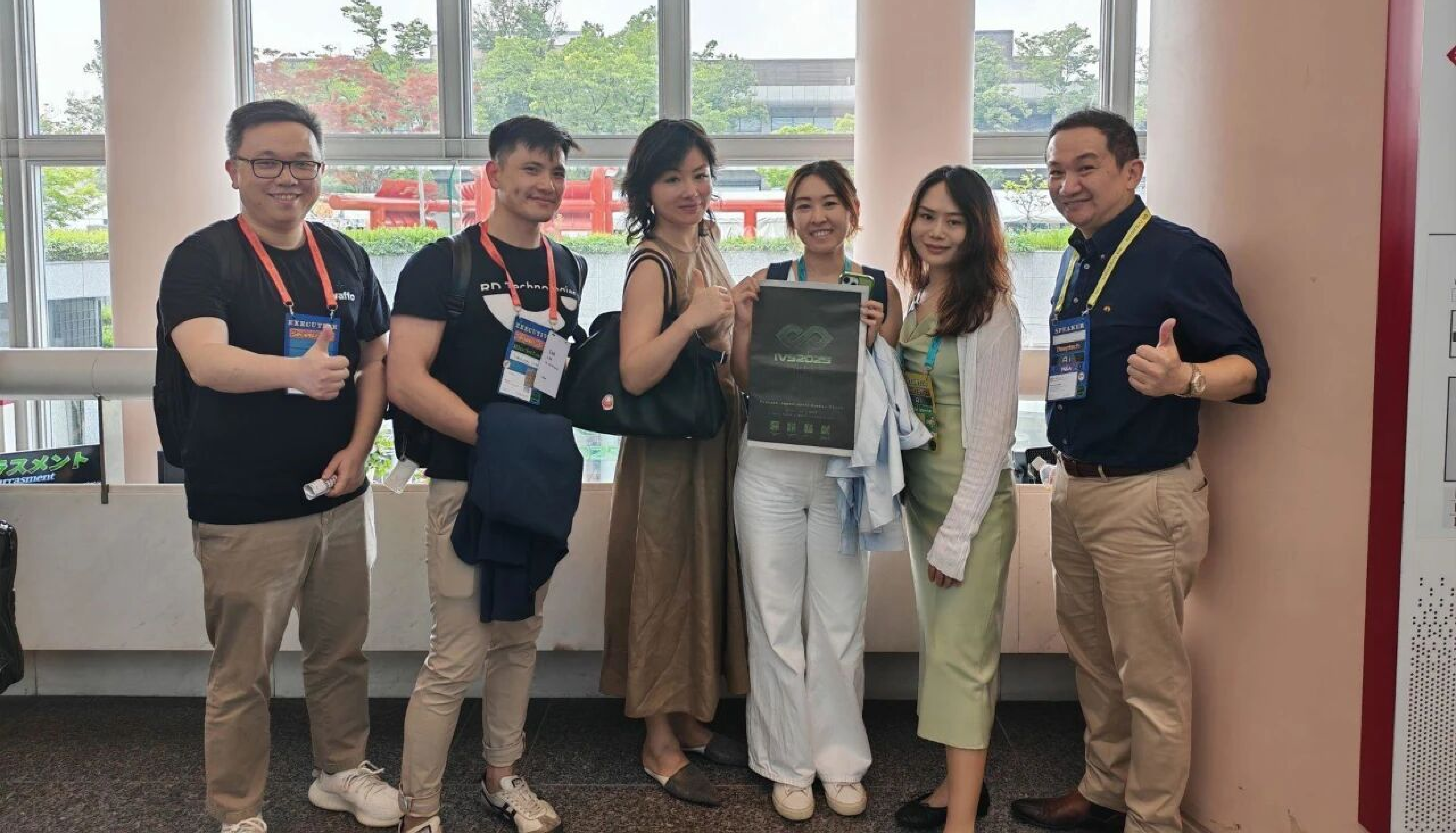 Waffo team members and delegates posing at IVS 2025 Kyoto Japan's largest startup event.