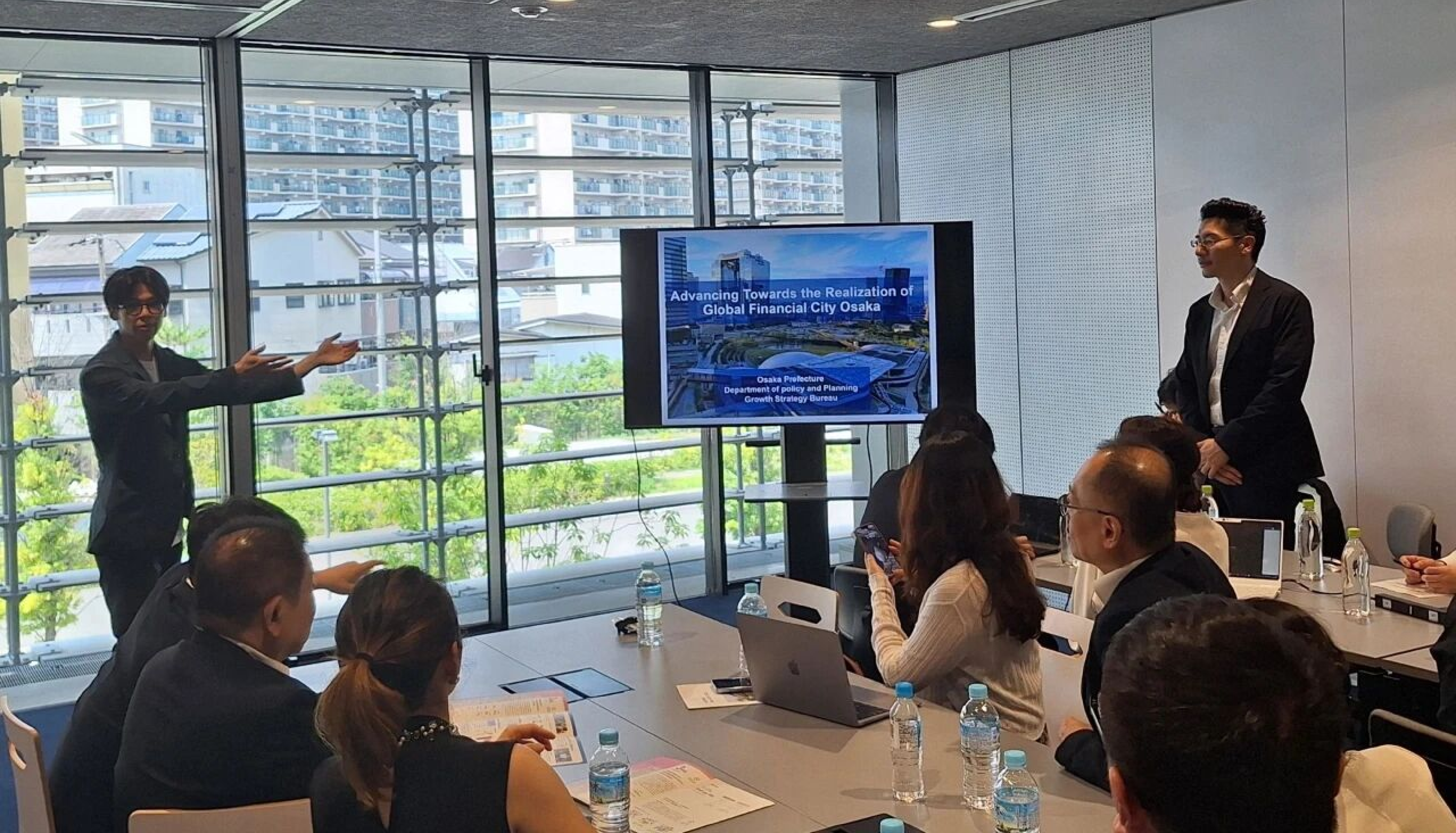 Presentation on Global Financial City Osaka during meeting with Osaka Prefecture Government Department of Policy and Planning.